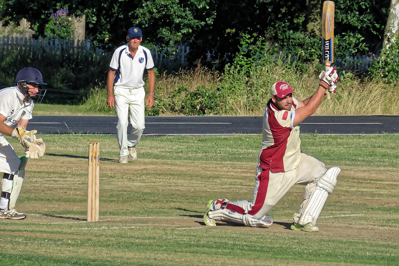 Shamim Hossain executing an aggressive sweep shot during a match