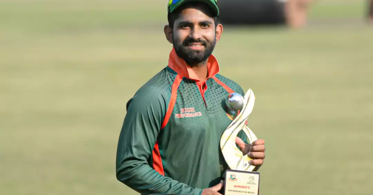 Shamim Hossain, Bangladeshi cricketer, standing on the field in team uniform
