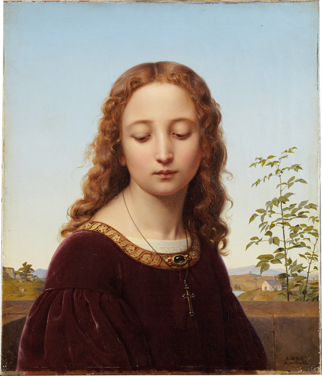 Young woman looking out over a Montana mountain landscape