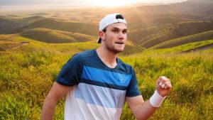 Jack Draper competing at Wimbledon representing British tennis talent