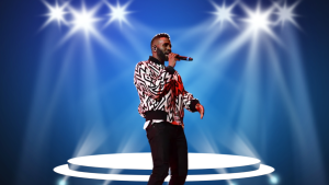 Jason Derulo smiling during a music video shoot in a stylish modern outfit and urban background