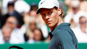 Italian tennis star Jannik Sinner competing in a professional ATP Tour match