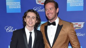 Full-body shot illustrating how tall is timothee chalamet with his signature slender posture and framing.